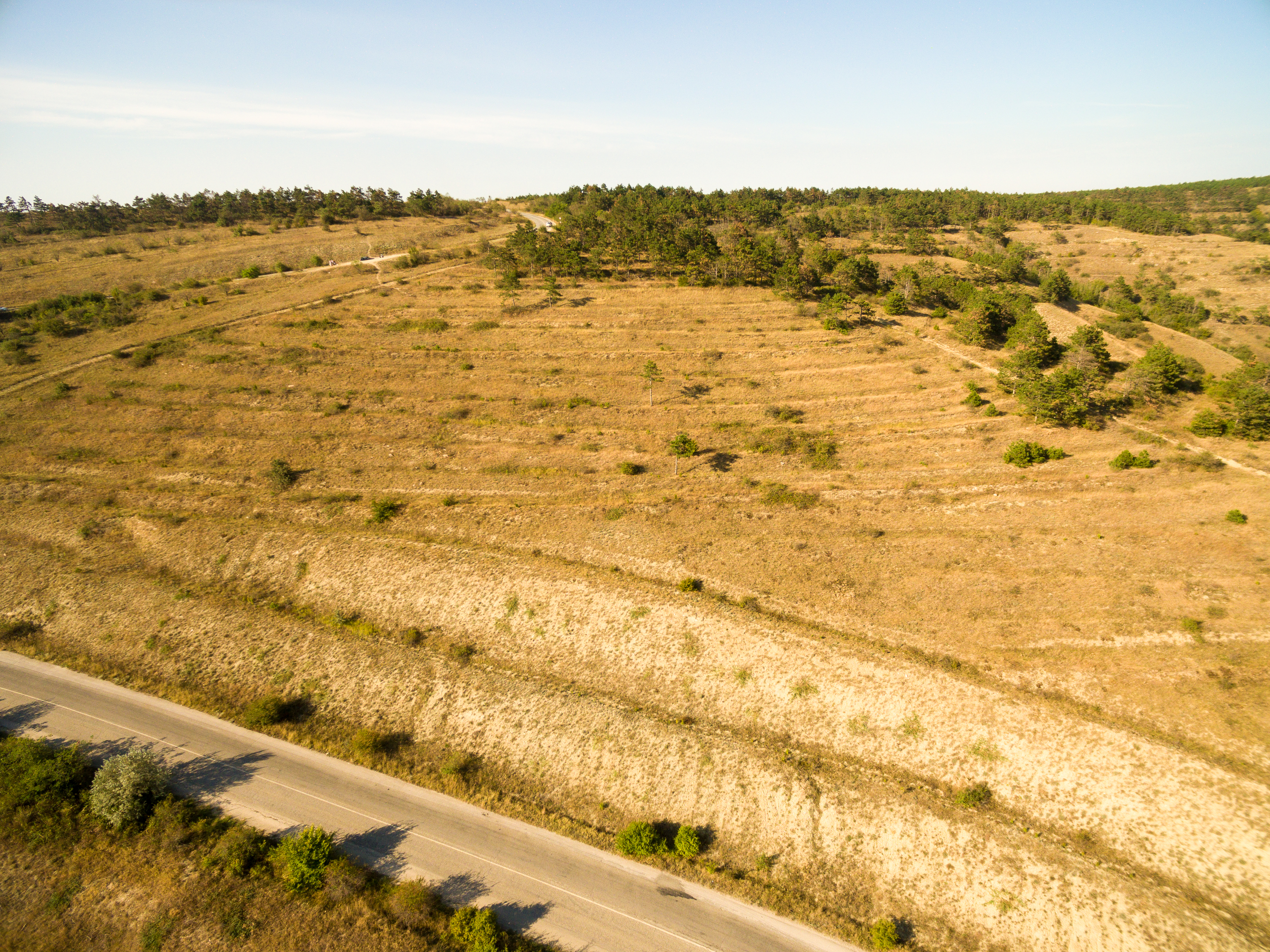 This is usually done to make the land more useful for bigger building projects or to increase its value. It helps developers get more out of the space.